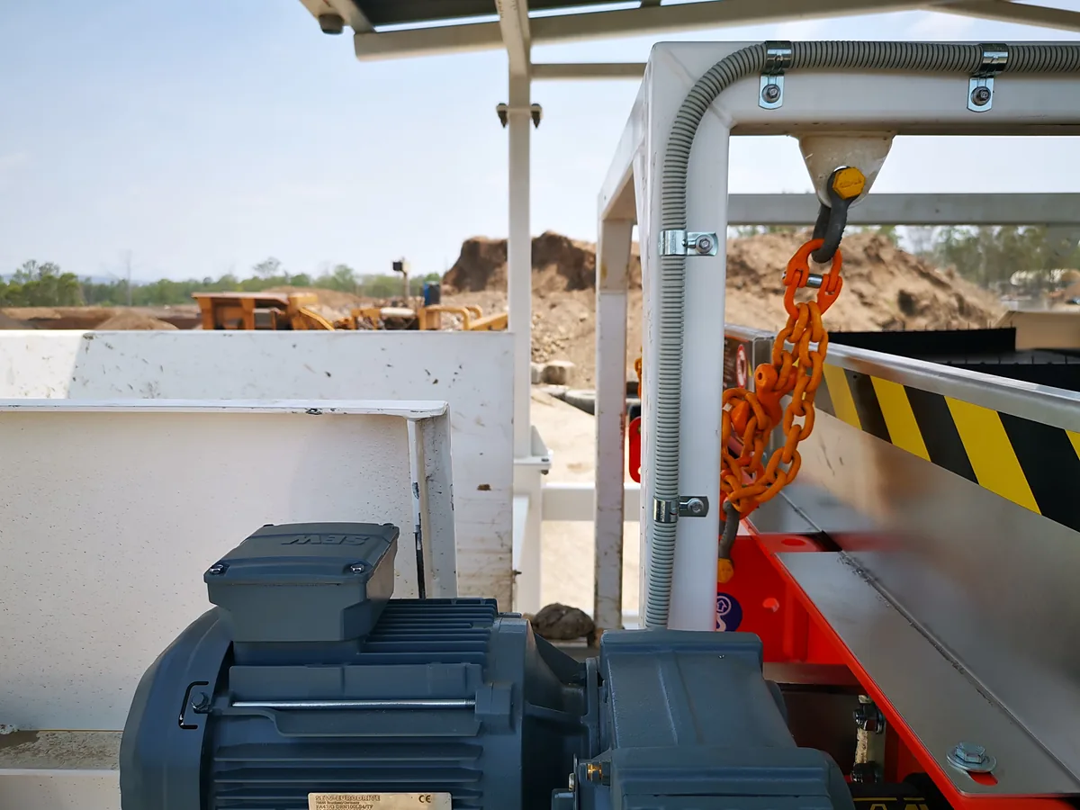 Industrial electric motor and guarding on a plant site