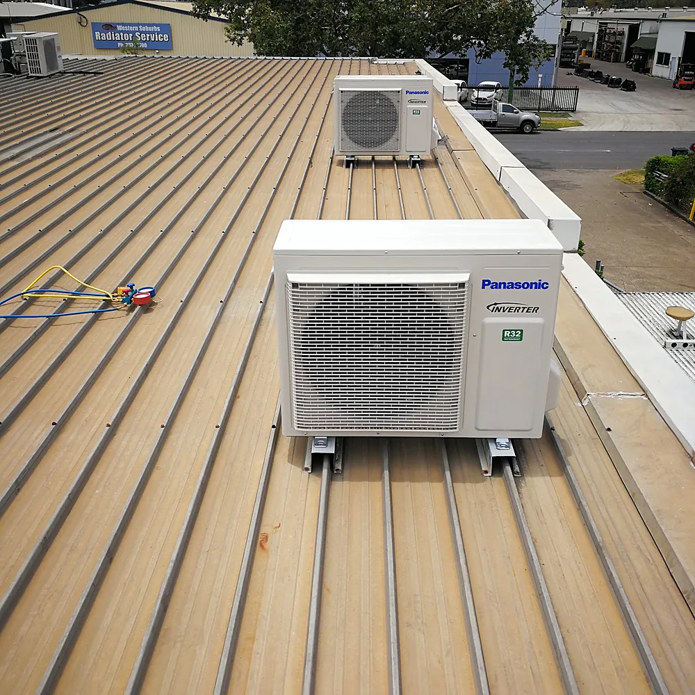 Panasonic inverter split system outdoor unit installed on a metal roof